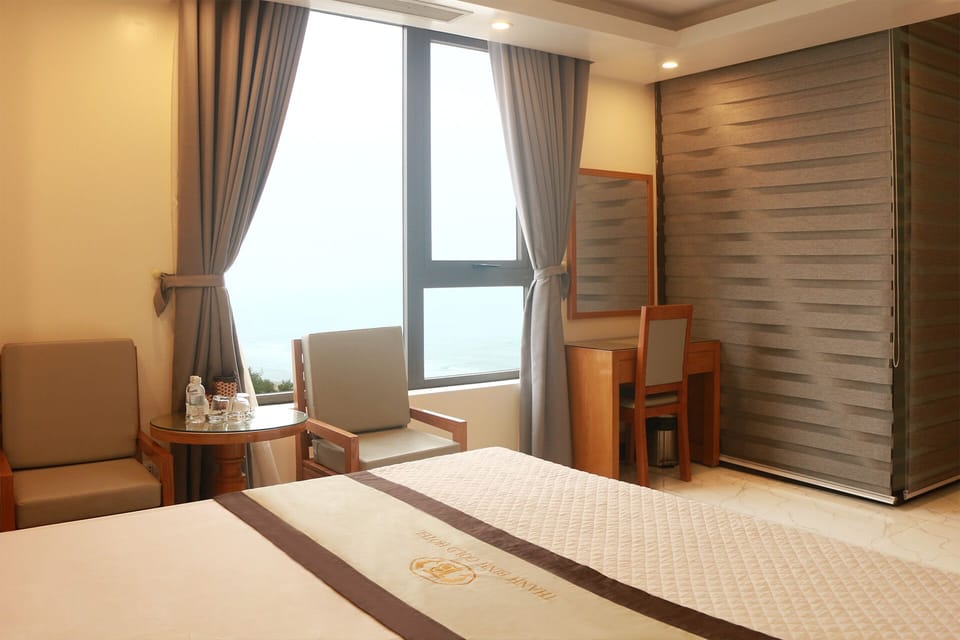 Deluxe Double Room, Beach View | Minibar, desk, free WiFi