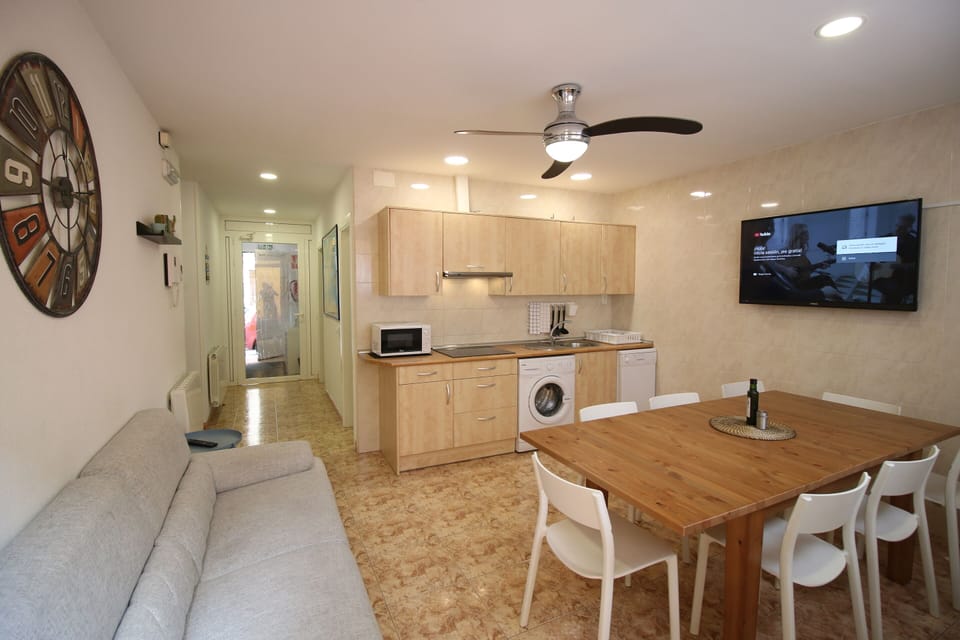 Apartment, 4 Bedrooms | Living area | 32-inch Smart TV with digital channels, TV, streaming services