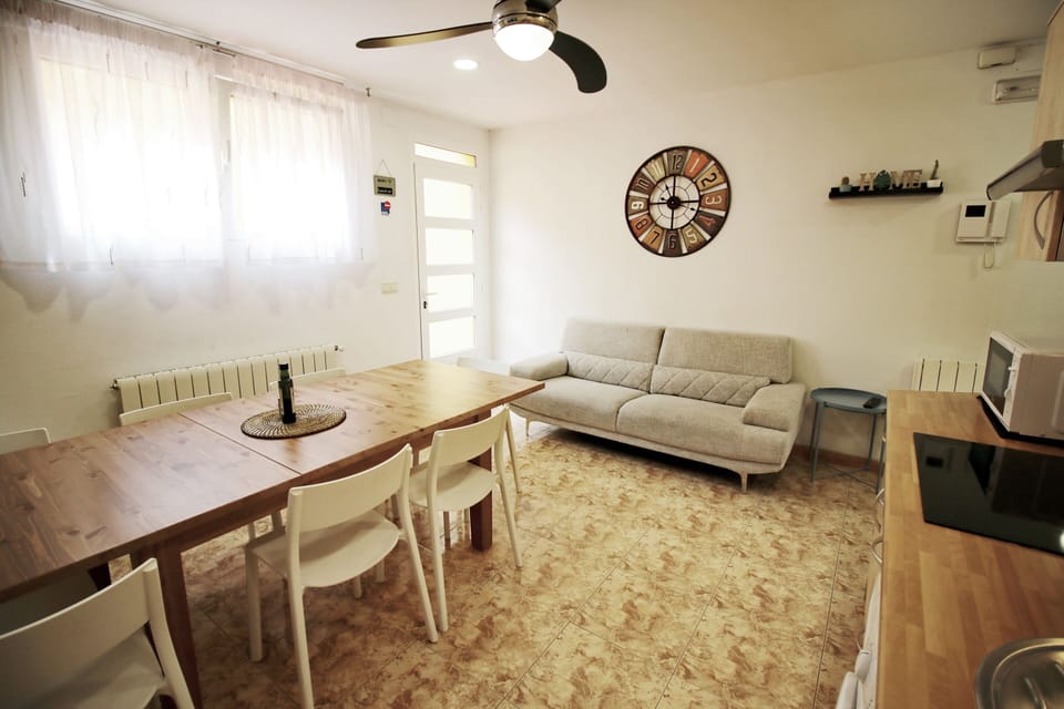 Apartment, 4 Bedrooms | Living area | 32-inch Smart TV with digital channels, TV, streaming services
