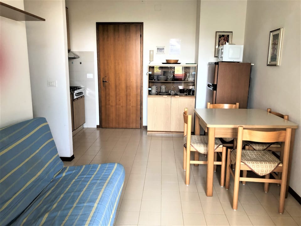 Apartment, 1 Bedroom (A40071) | Private kitchenette | Full-size fridge, microwave, stovetop, cookware/dishes/utensils