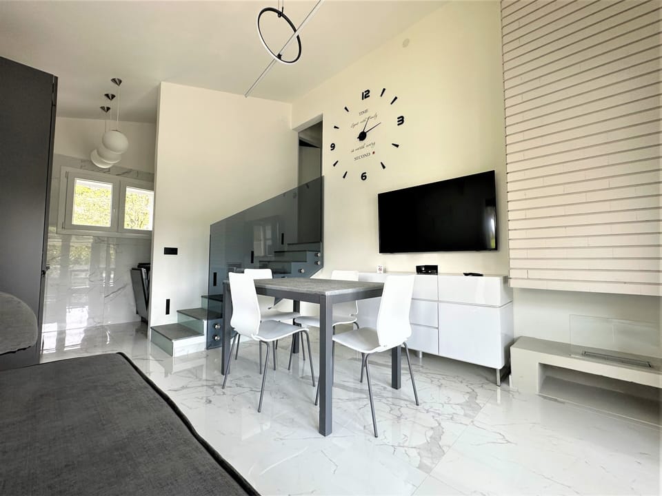 Apartment, 2 Bedrooms (B50936) | Living area | 19-inch flat-screen TV with satellite channels, TV