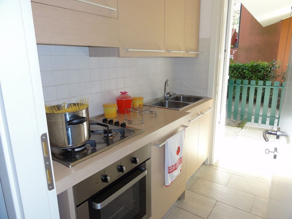 Apartment, 2 Bedrooms (C30503) | Private kitchen | Full-size fridge, stovetop, cookware/dishes/utensils