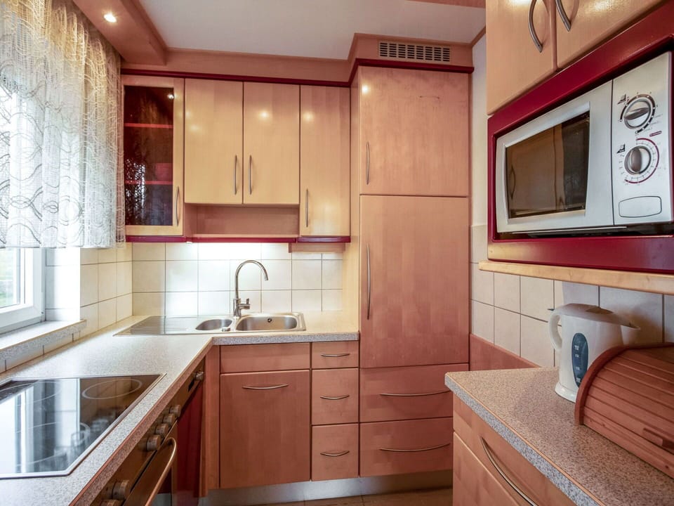 Countertop, Room, Cabinetry, Property, Furniture, Kitchen, Interior Design, Building, Sink, Floor