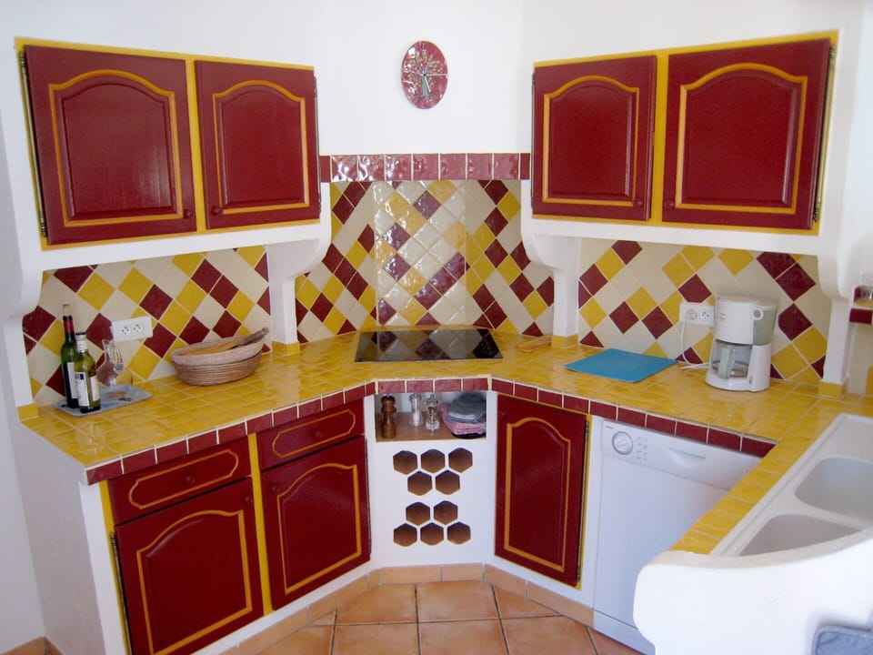 Villa | Private kitchen | Fridge, highchair