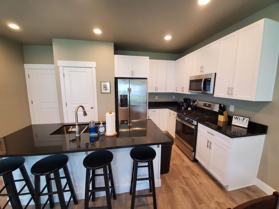 Fully stocked kitchen with granite countertops