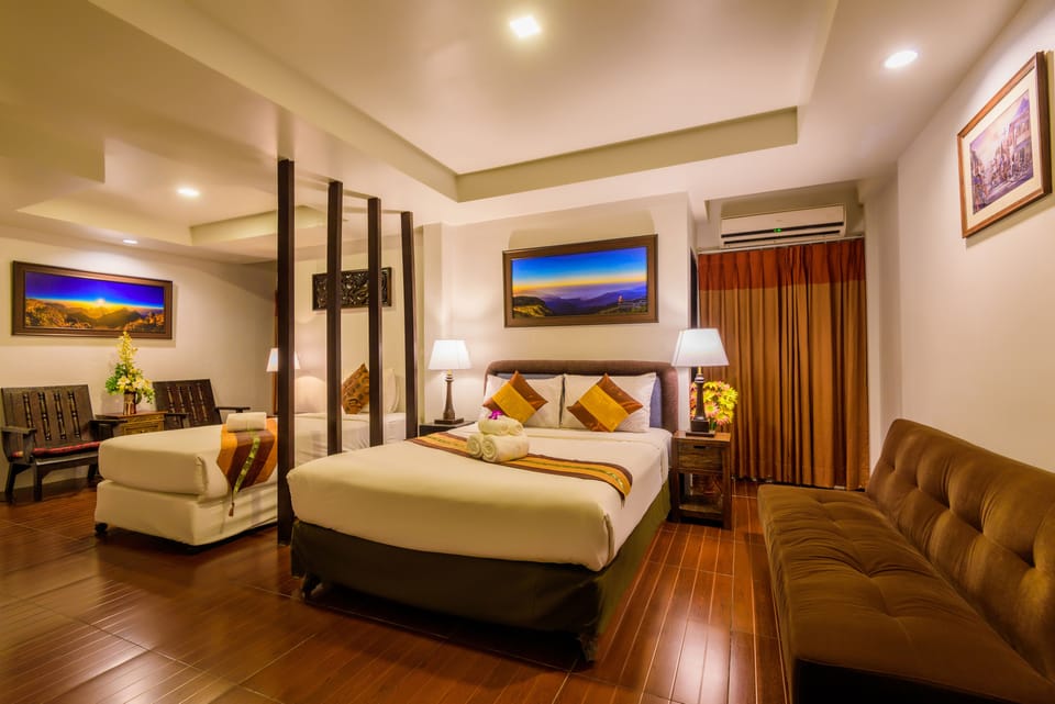 Family Room | Down comforters, Select Comfort beds, minibar, in-room safe
