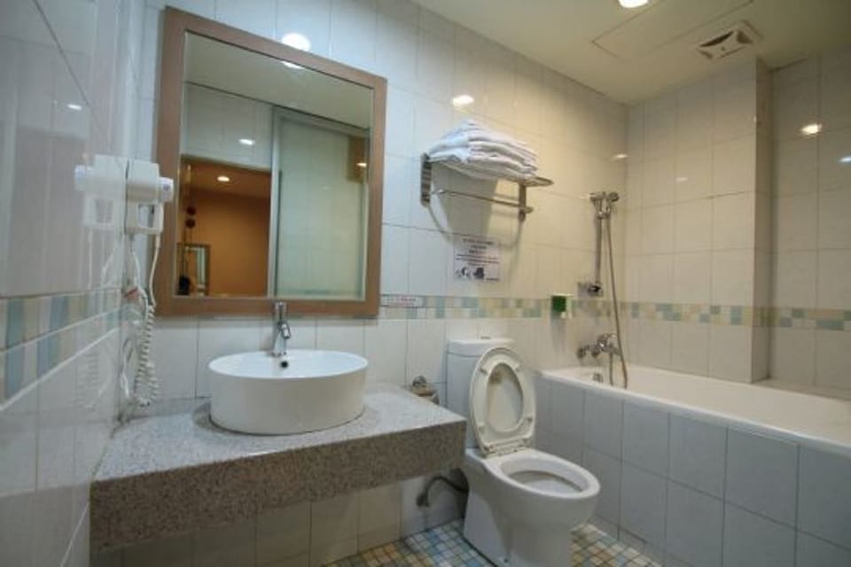 Shower, free toiletries, hair dryer, slippers