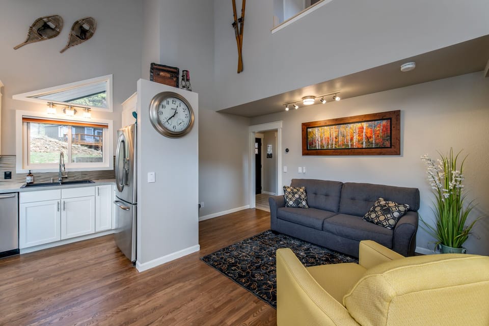 Main floor open concept kitchen and living area.