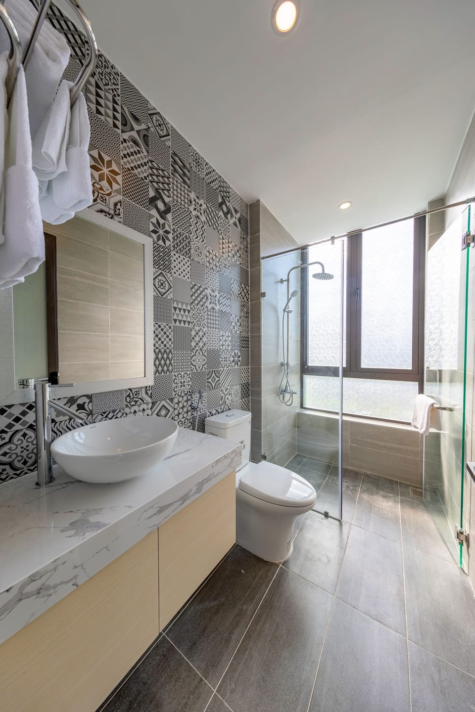 Shower, rainfall showerhead, designer toiletries, hair dryer