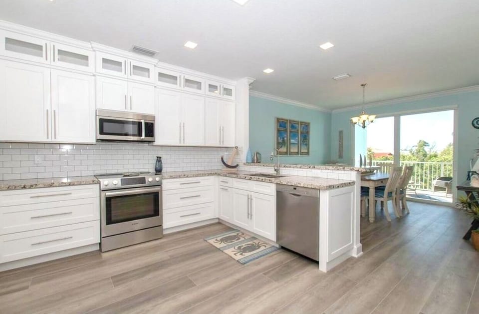 2nd-floor fully stocked gourmet kitchen with stainless steel Bosch appliances