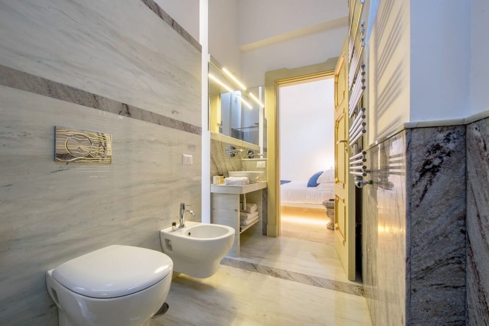 Classic Room | Bathroom | Shower, rainfall showerhead, hair dryer, slippers