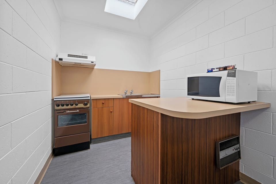 Standard Room, Multiple Beds, Non Smoking | Private kitchen | Fridge, electric kettle, toaster, cleaning supplies