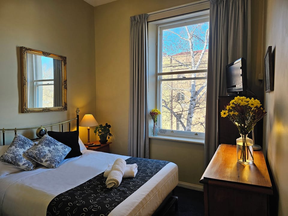 Petite Double Room  | Premium bedding, pillowtop beds, individually decorated