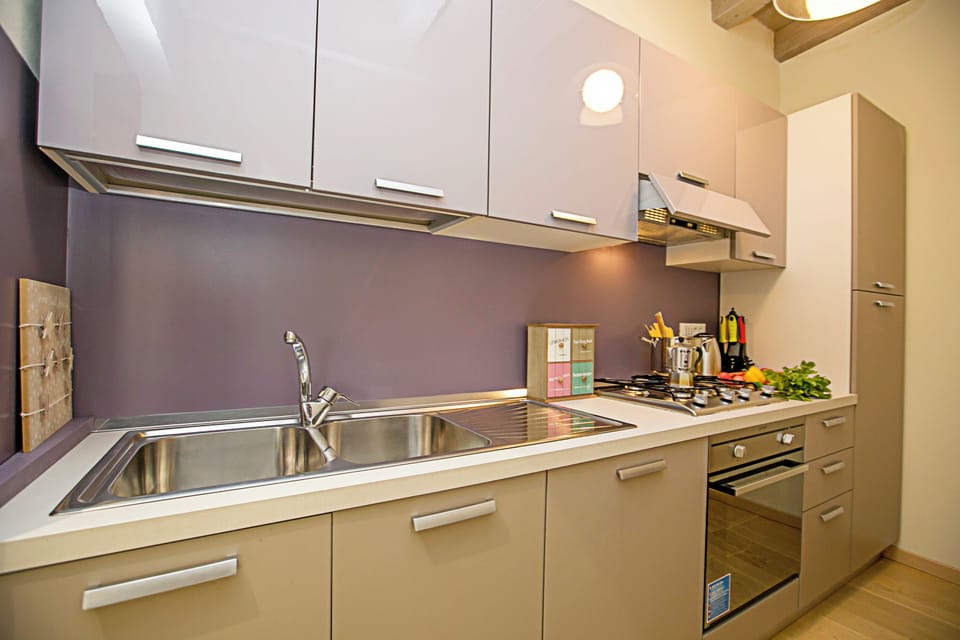 Family Apartment, Multiple Bedrooms (Residenza Il Cavaliere del Lago) | Private kitchen | Full-size fridge, microwave, oven, stovetop