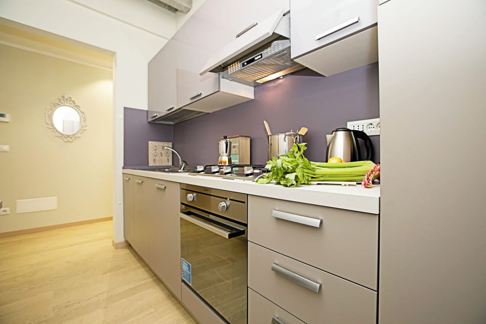 Family Apartment, Multiple Bedrooms (Residenza Il Cavaliere del Lago) | Private kitchen | Full-size fridge, microwave, oven, stovetop