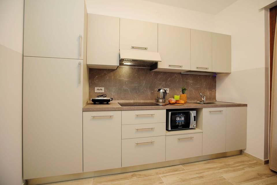 Family Apartment, 2 Bedrooms, Balcony (Bella Arco Apartment) | Private kitchen | Full-size fridge, microwave, stovetop, electric kettle