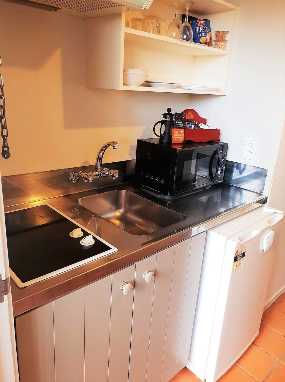 Mini-fridge, microwave, stovetop, electric kettle