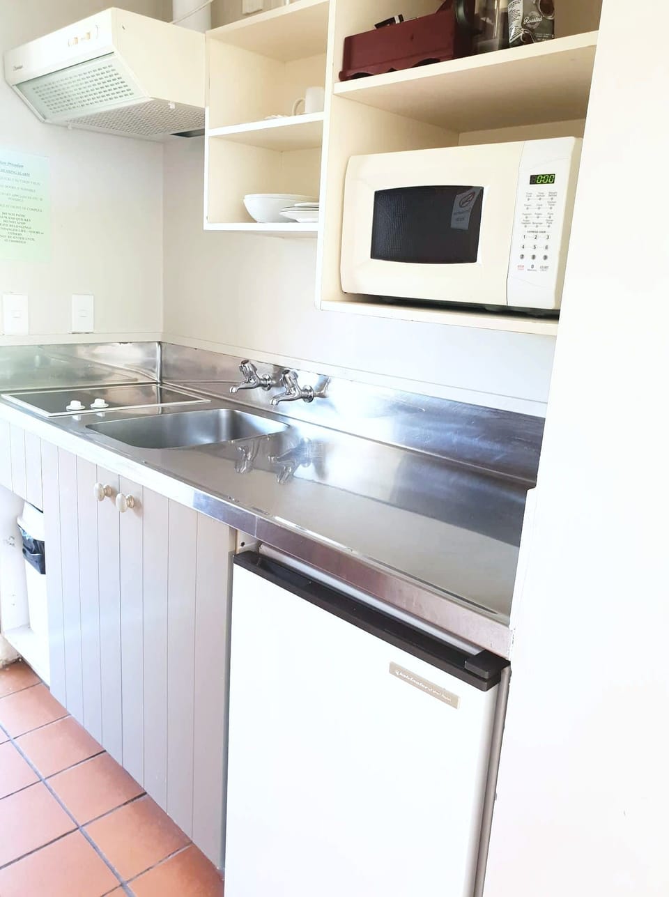 Mini-fridge, microwave, stovetop, electric kettle