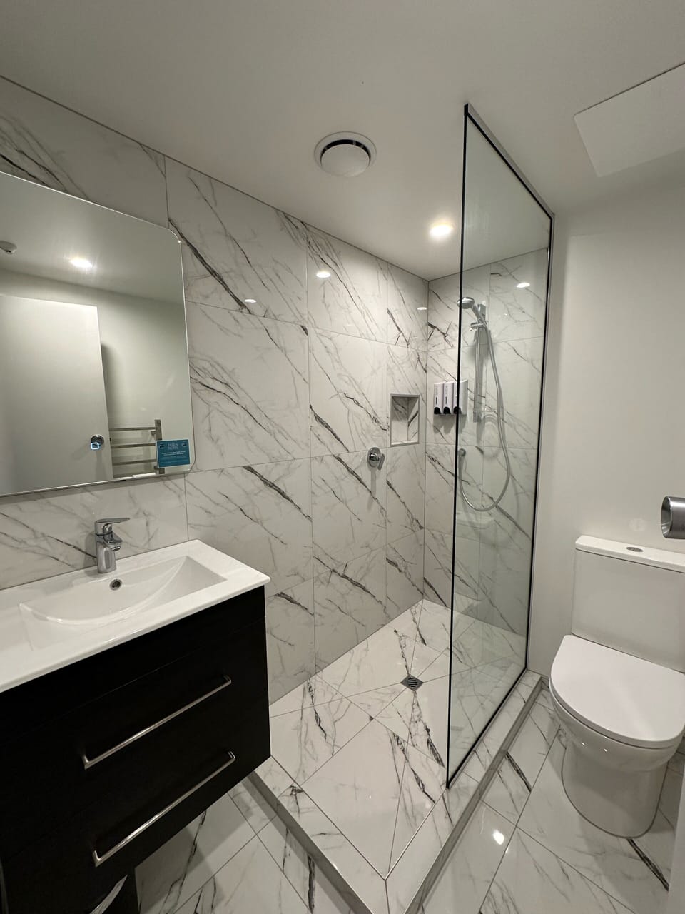 Shower, free toiletries, hair dryer, towels
