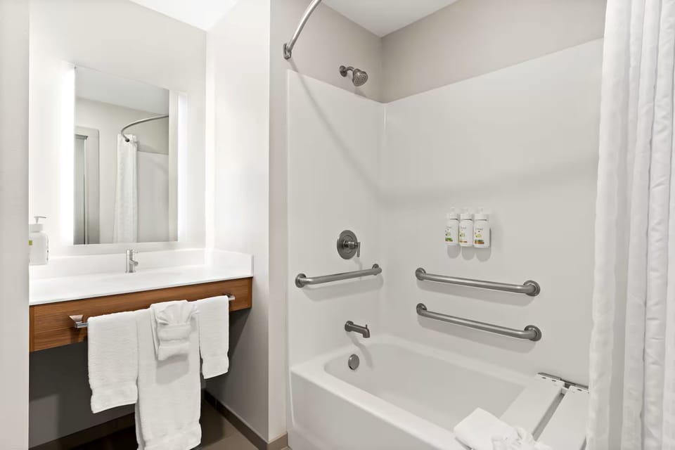 Suite, 1 King Bed, Accessible Bathtub (Mobility) | Bathroom | Free toiletries, hair dryer, towels, soap