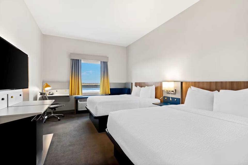Standard Room, 2 Queen Beds | Hypo-allergenic bedding, individually decorated, desk, laptop workspace