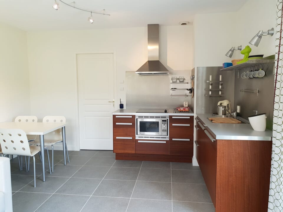 Villa | Private kitchen | Fridge, highchair