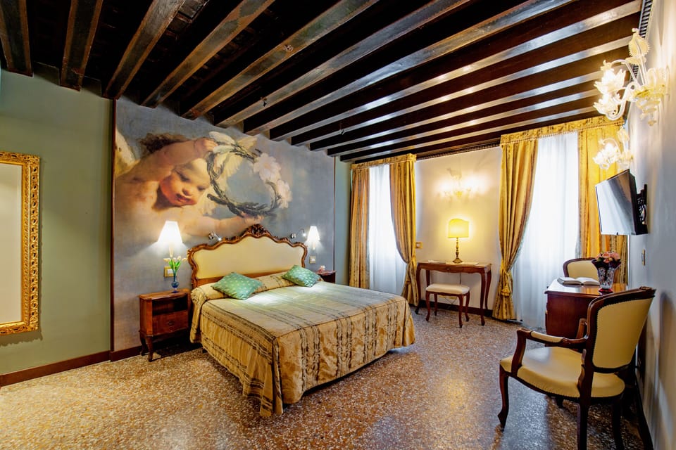 Deluxe Room, City View | In-room safe, individually decorated, individually furnished, desk