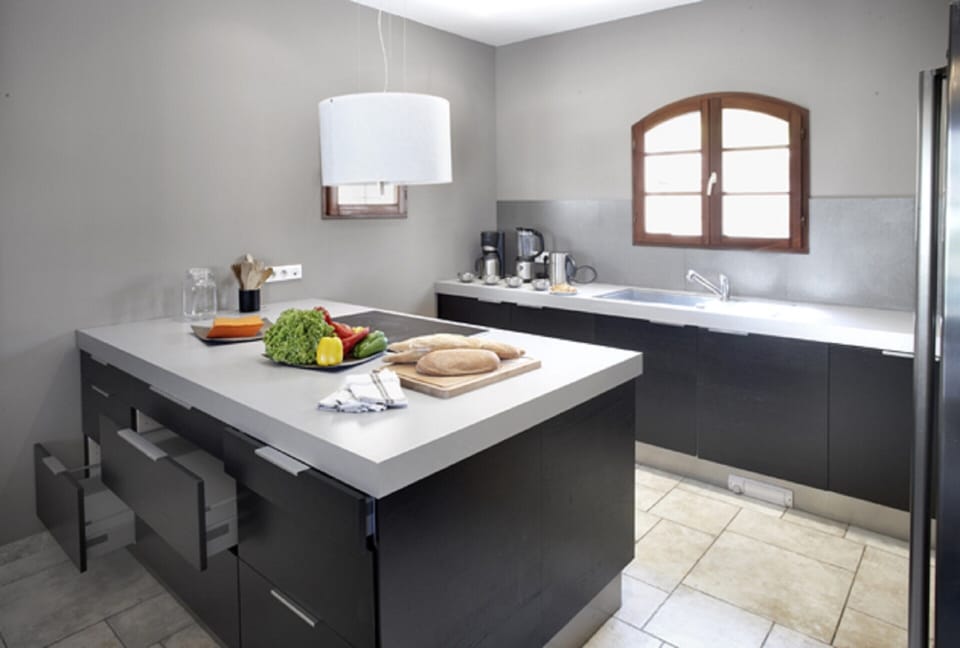 Villa | Private kitchen | Fridge, highchair