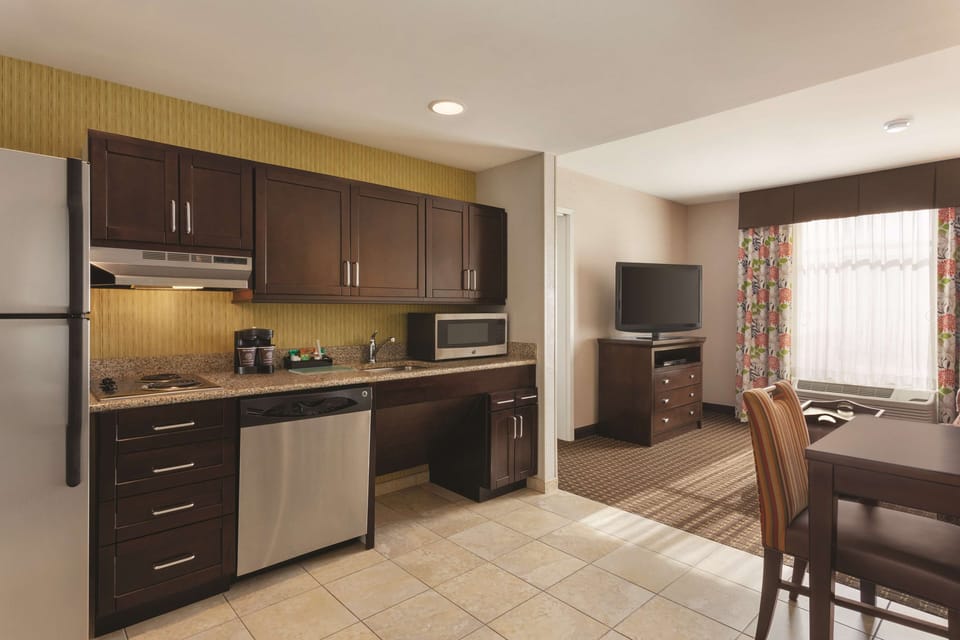 Suite, 1 King Bed, Accessible, Bathtub | In-room safe, desk, laptop workspace, soundproofing