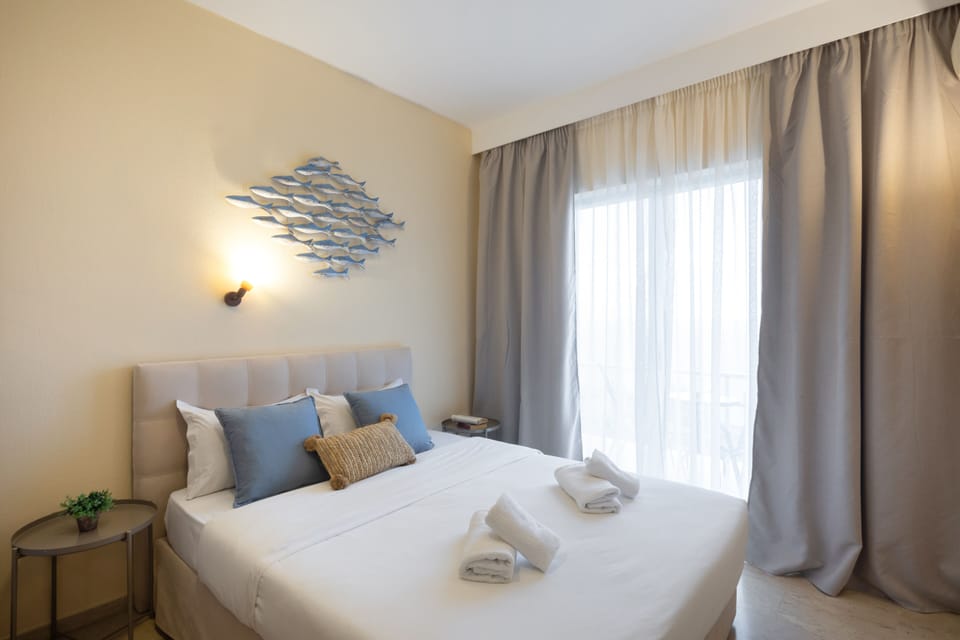 Family Room, Partial Ocean View | In-room safe, desk, blackout drapes, free cribs/infant beds