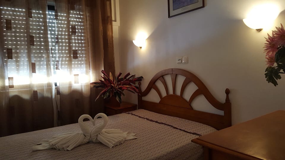 Desk, blackout drapes, free WiFi, bed sheets