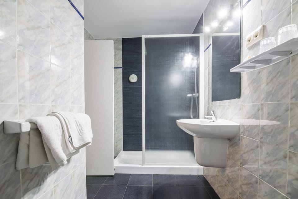 Shower, towels, soap, shampoo
