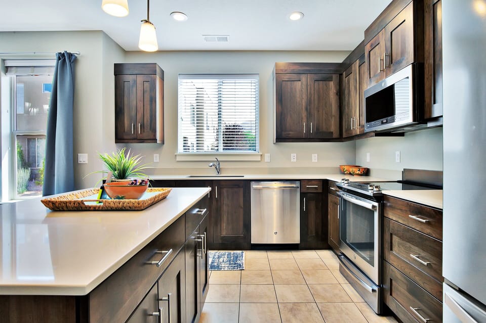 Clean and well equipped Kitchen with Island Top