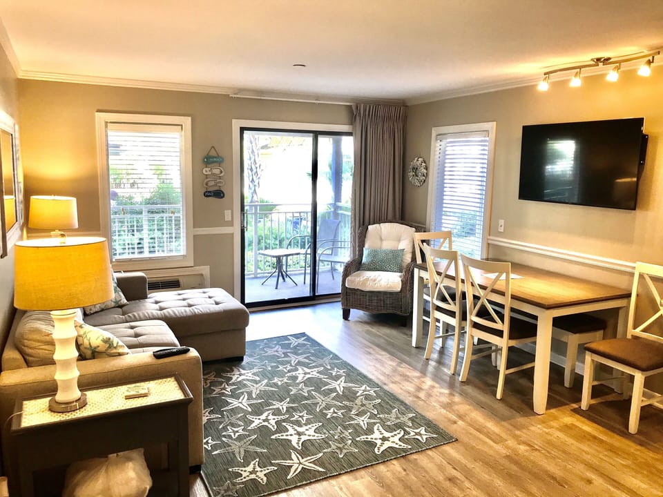 Table w/bench underneath has plenty of room for 6 people, new 55in smart tv