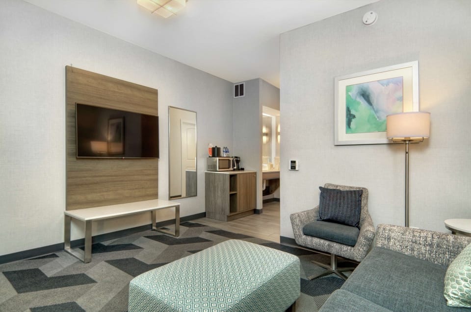 Suite, 1 King Bed, Accessible | Desk, laptop workspace, iron/ironing board, free cribs/infant beds