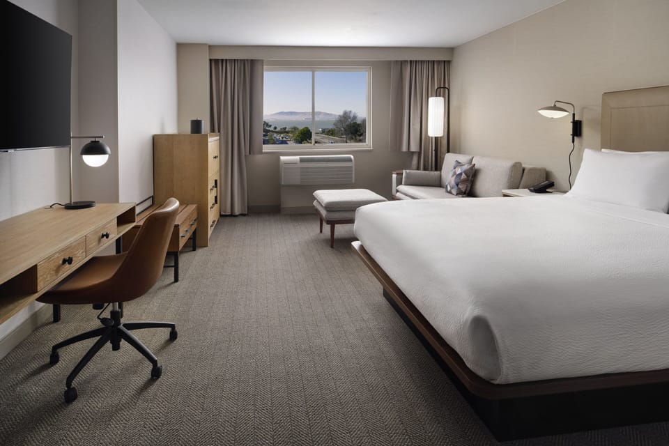 Room, 1 King Bed with Sofa bed | Desk, laptop workspace, blackout drapes, iron/ironing board