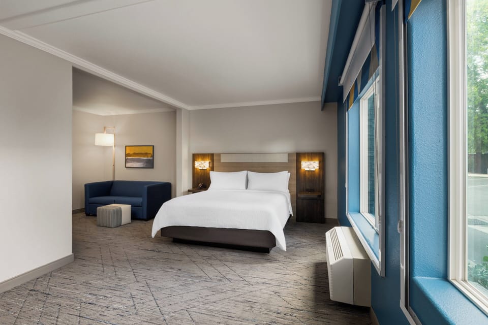 Suite, 1 King Bed, Jetted Tub | Pillowtop beds, desk, laptop workspace, blackout drapes