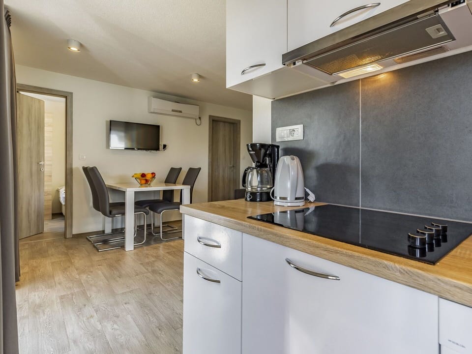 Cabinetry, Countertop, Furniture, Property, Kitchen Sink, Kitchen Appliance, Kitchen Stove, Chair, Sink, Kitchen