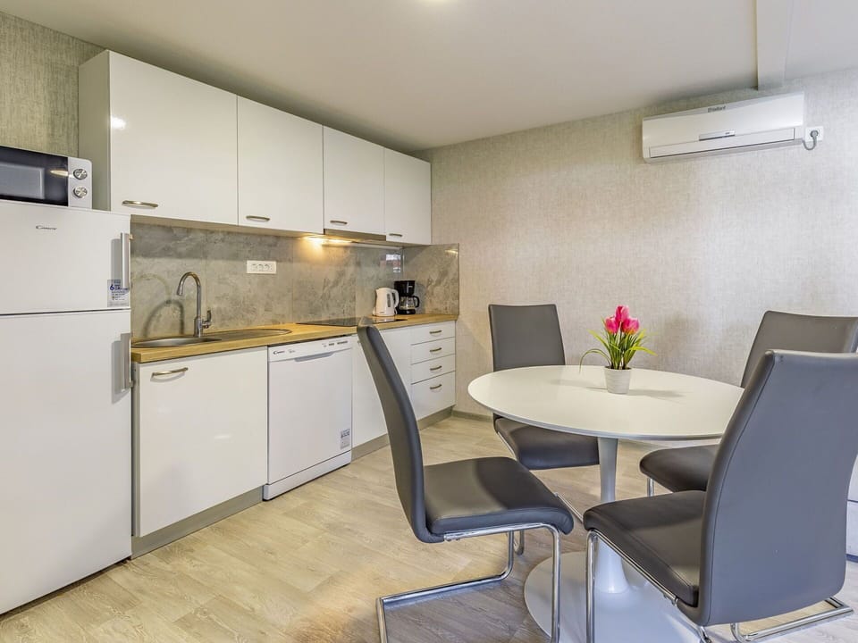 Furniture, Cabinetry, Sink, Countertop, Kitchen Sink, Building, Chair, Tap, Table, Kitchen Stove