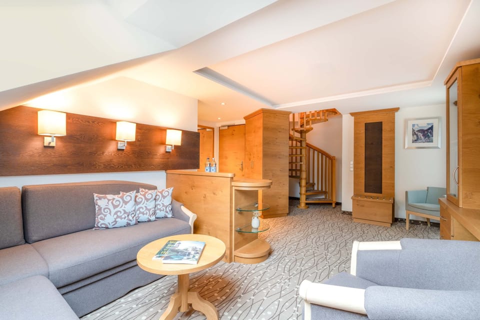 Comfort Suite, 1 Bedroom, Non Smoking, Balcony | Living area | 66-cm flat-screen TV with satellite channels, TV