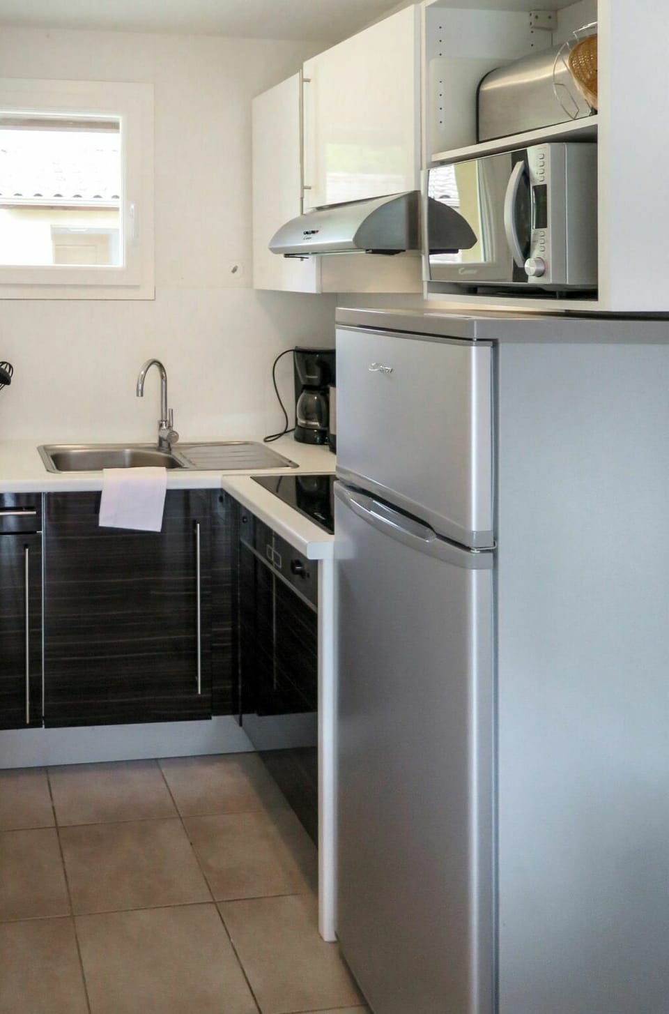Countertop, Kitchen, Room, Cabinetry, Furniture, Property, Major Appliance, Kitchen Stove, Floor, Interior Design