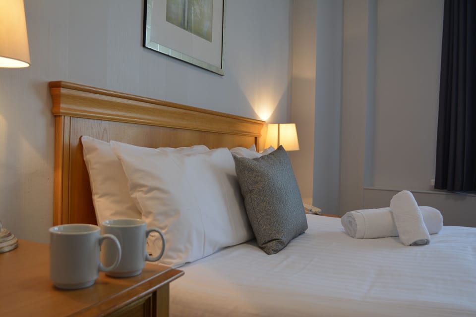 Desk, iron/ironing board, WiFi (free), alarm clocks