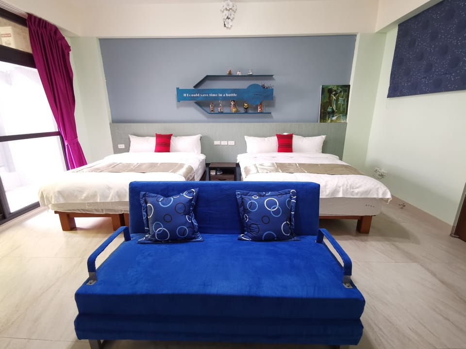 Deluxe Quadruple Room | Individually furnished, blackout drapes, free WiFi, bed sheets