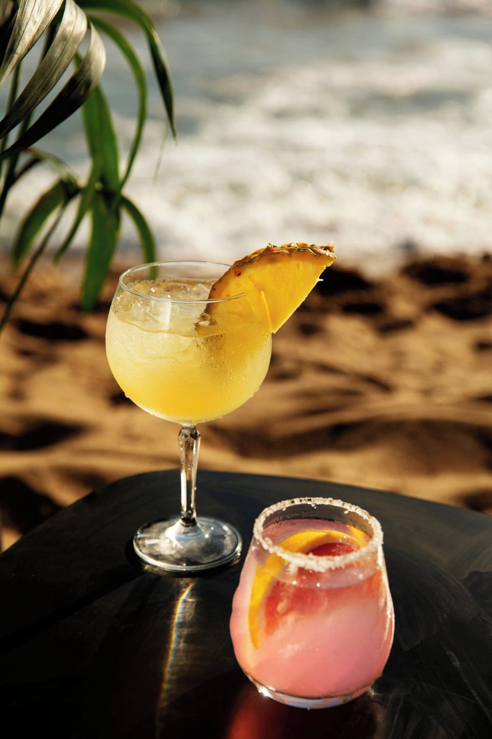 On the beach, white sand, sun loungers, beach umbrellas