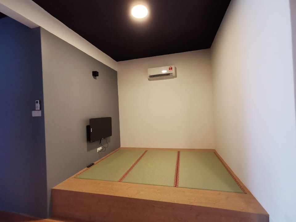 Deluxe Suite, 2 Bedrooms (L50) | Living area | Flat-screen TV