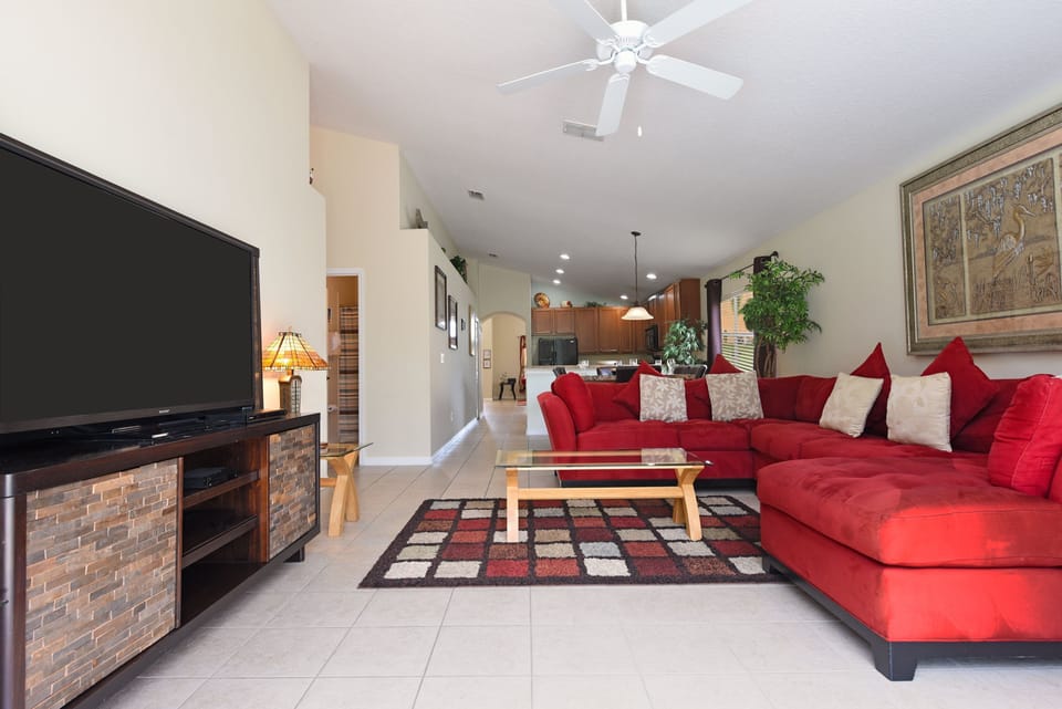 Open-concept living area with cozy seating and a bright, airy layout.