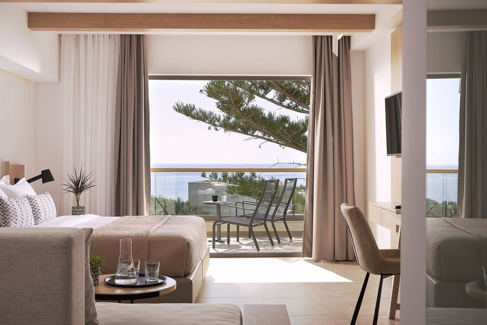 Junior Suite, Sea View | Premium bedding, down comforters, memory foam beds, in-room safe