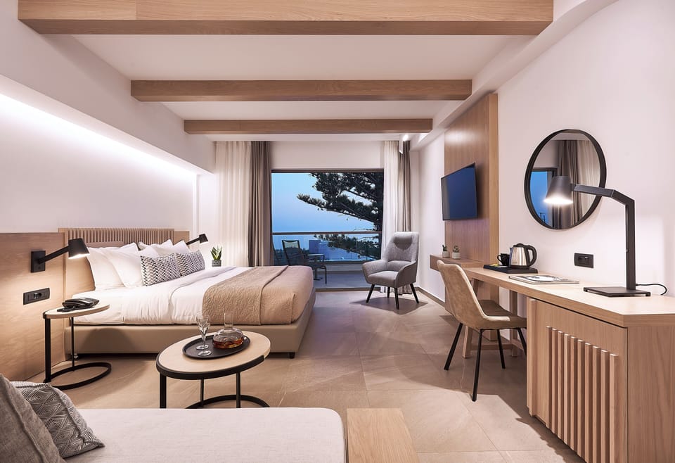Junior Suite, Sea View | Premium bedding, down comforters, memory foam beds, in-room safe