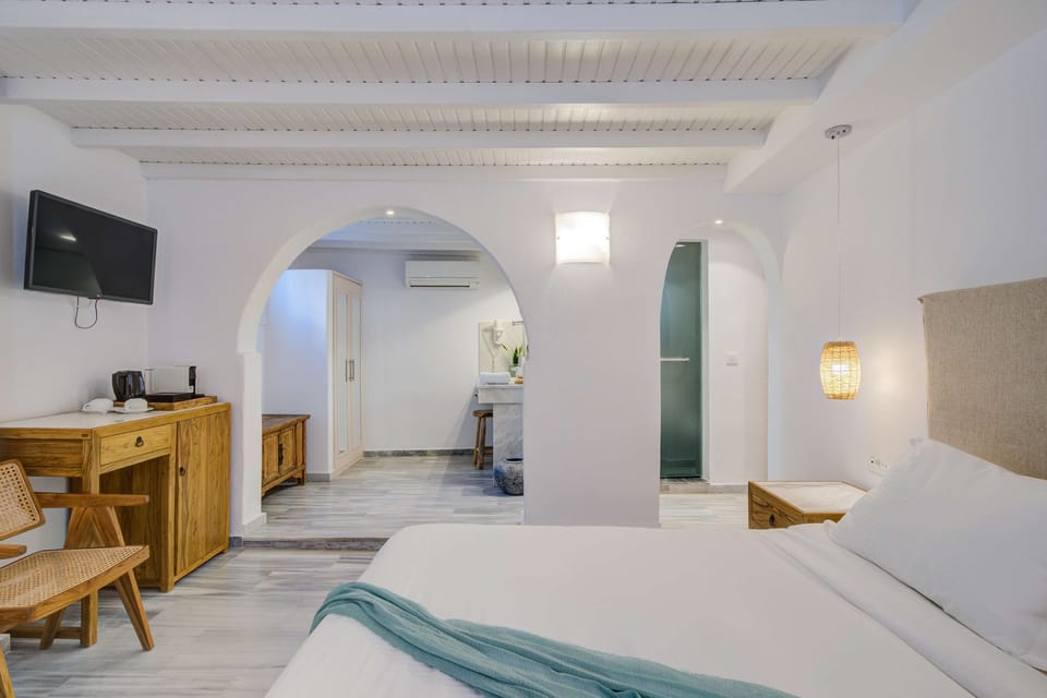 Egyptian cotton sheets, premium bedding, down comforters, minibar