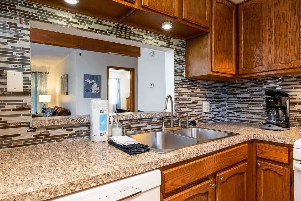 Unit B: Kitchen is open to dining and living room